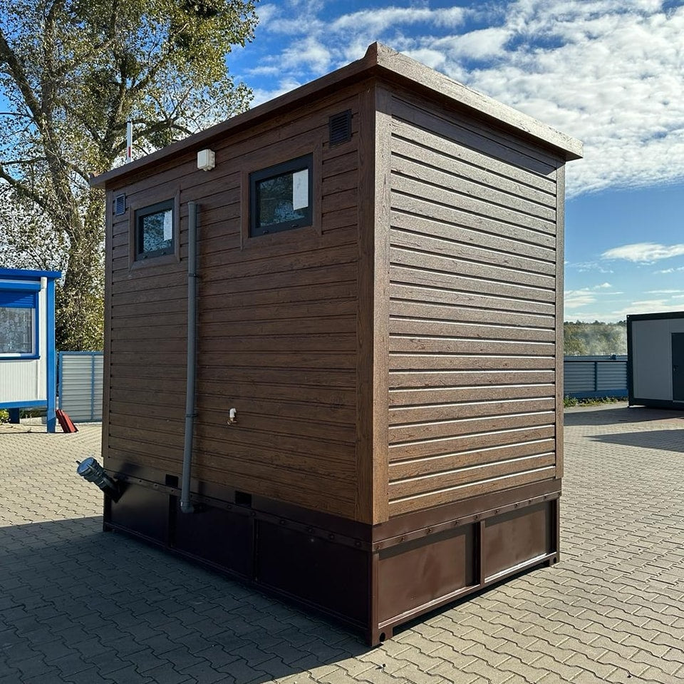 Contenedor sanitario con tanque de retención