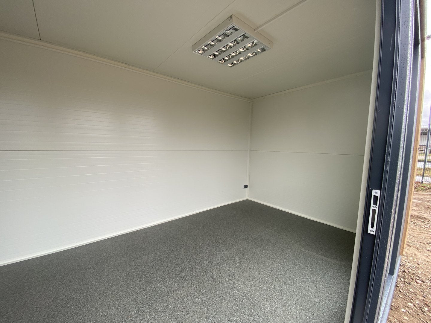 Contenedor de tienda/sala de ventas/contenedor de oficina tipo casa de jardín "Linz"