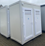 Contenedor sanitario con inodoro y ducha.